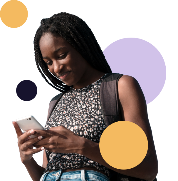 Black woman happy holding phone