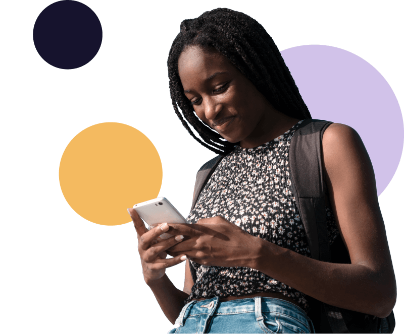 Black woman happy holding phone