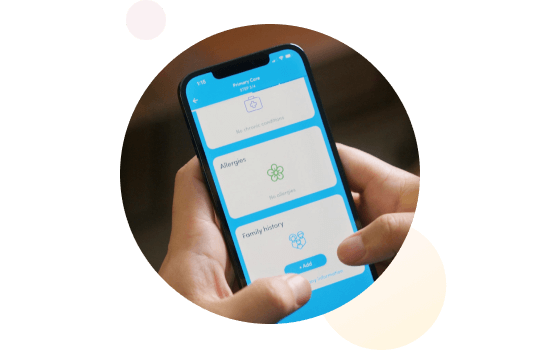 A person typing on their phone and interacting with the K Health app